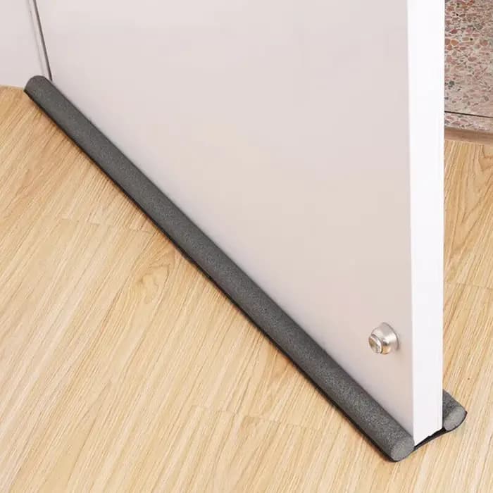 Bande d'étanchéité pour bas de porte