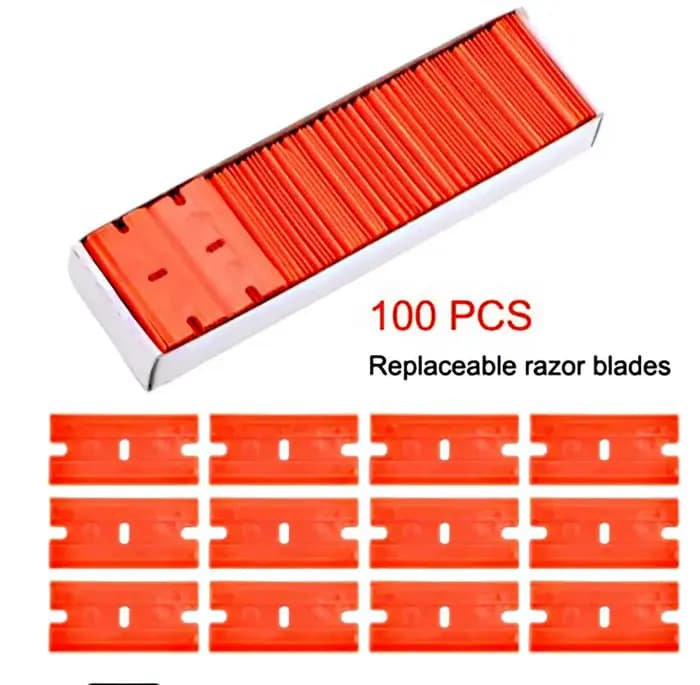Lame de rasoir en plastique à deux coupes