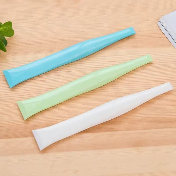 Grattoir de nettoyage double extrémité pour cuisinière à gaz