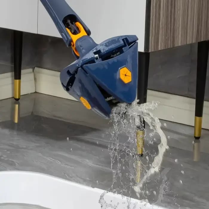 Serpillère triangulaire rotative avec manche télescopique long