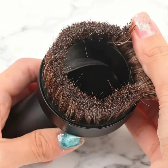 Fixation d'aspirateur noir
