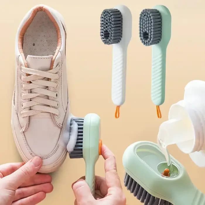 Brosse de nettoyage avec distributeur de savon