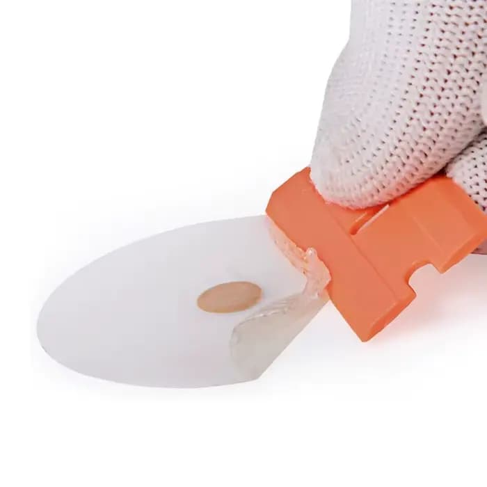Lame de rasoir en plastique à deux coupes