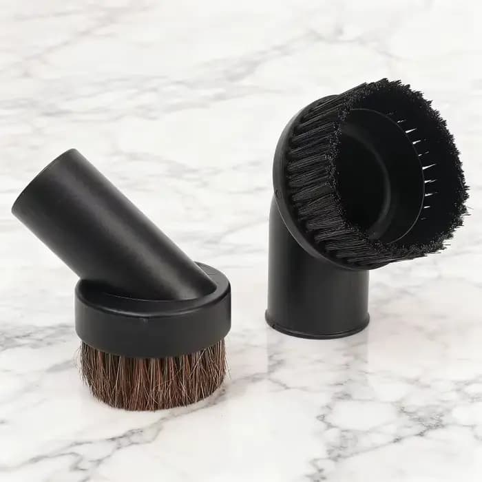 Fixation d'aspirateur noir