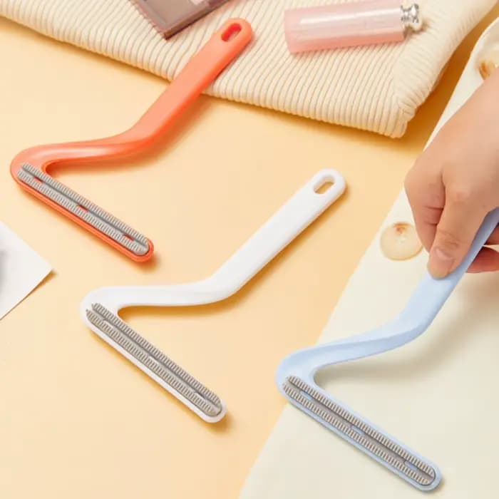 Brosse électrostatique pour balayeuse de sol et tapis