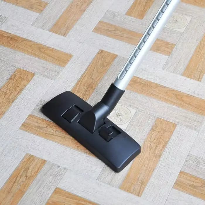 Brosse de fixation pour aspirateur de sol
